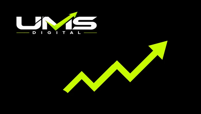 UMS Digital business card front with the logo and a green arrow